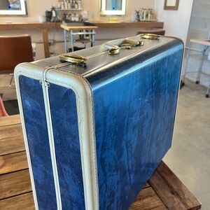 Vintage Blue Suitcase with Gold Accents